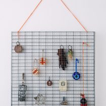 Keepers, 2015 Steel hardware cloth, found amulets 18 x 12 x 2”