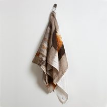 Drape #3, 2023 Rust dyed damask napkins, vitreous enamel on copper, found laundry pin 38 x 16 x 3' (approx.)